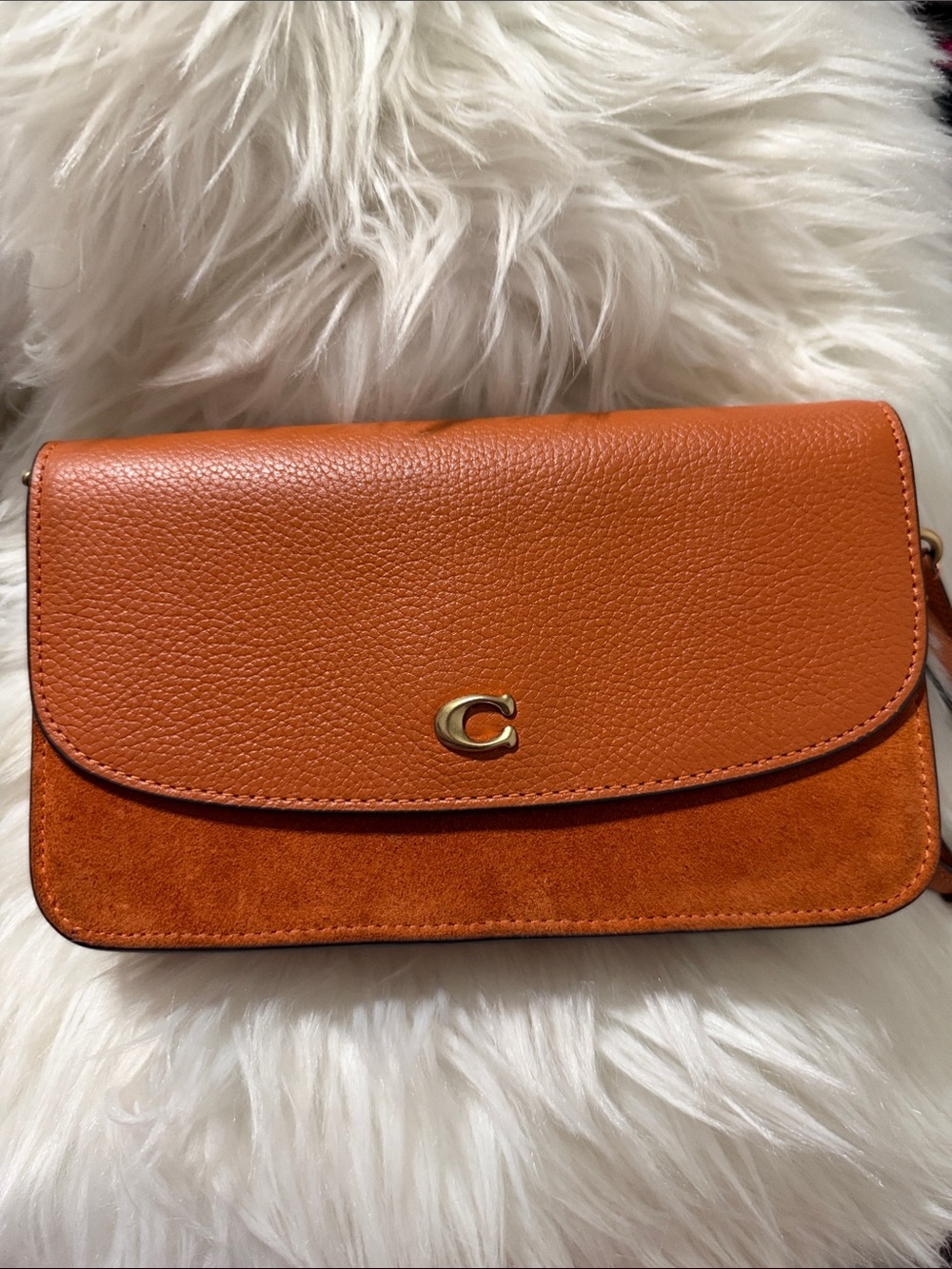 Coach Tan Pebbled Leather &
Suede Crossbody